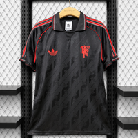 MANCHESTER UNITED HERITAGE BLACK EXCLUSIVE JERSEY